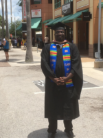 Edward Ray ed best life with grad cap and gown on